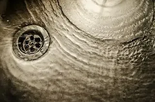 water flowing freely down the sink